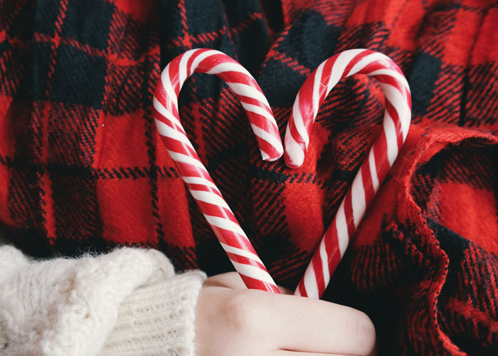 candy canes in the shape of a heart help over red plaid by little hands - help seniors during holidays