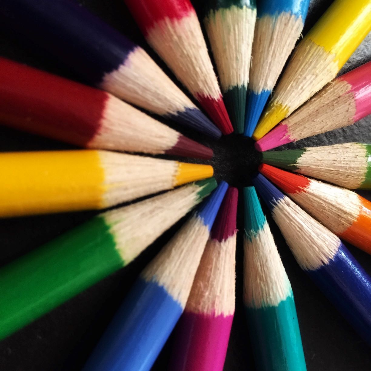 Brain health - Colorful Pencils in a rainbow of colors showing the pencil tips in a circle